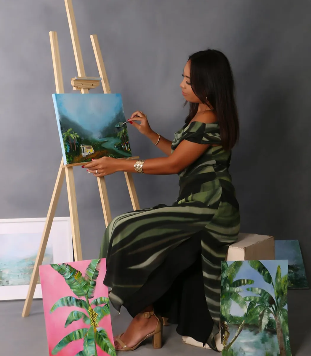 Margherita Iacopini painting a landscape at her easel